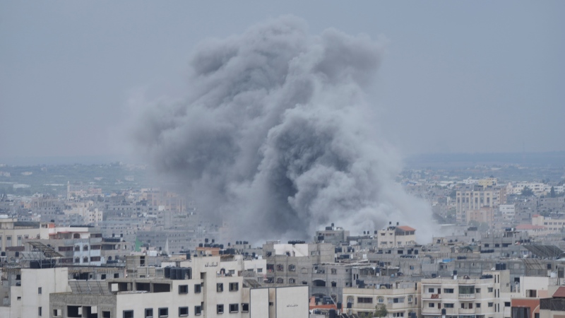Smoke from an Israeli airstrike rises in Gaza City on Monday, Oct. 9, 2023. (AP Photo/Hatem Moussa)